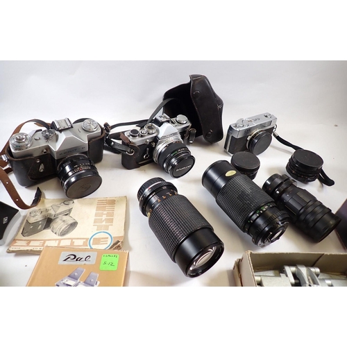 717 - A box of camera equipment including OMI with 50mm lens, etc.