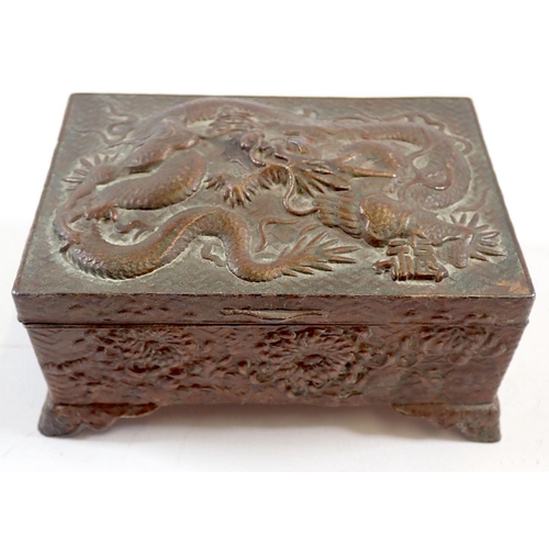 726 - A Japanese antimony cigarette box with dragon design, 12cm wide