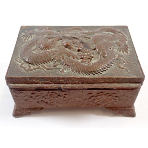 726 - A Japanese antimony cigarette box with dragon design, 12cm wide