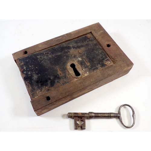 730 - A large antique box door lock and key, 23 x 14.5cm