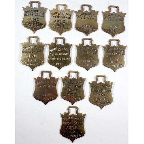 740 - A collection of twelve horse brasses for Winchester Horse Parade circa 1900-1910, mainly for 1st Pri... 