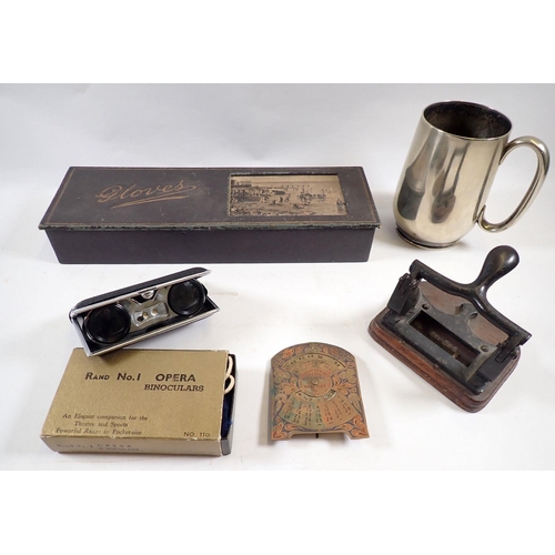 744 - A group of collectables including 1944-63 perpetual calendar, opera glasses, hole punch and glove bo... 