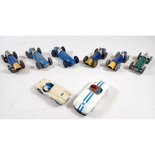 755 - A box of eight vintage Dinky racing cars