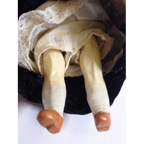 757 - A Victorian bisque headed small doll with porcelain legs, 16cm