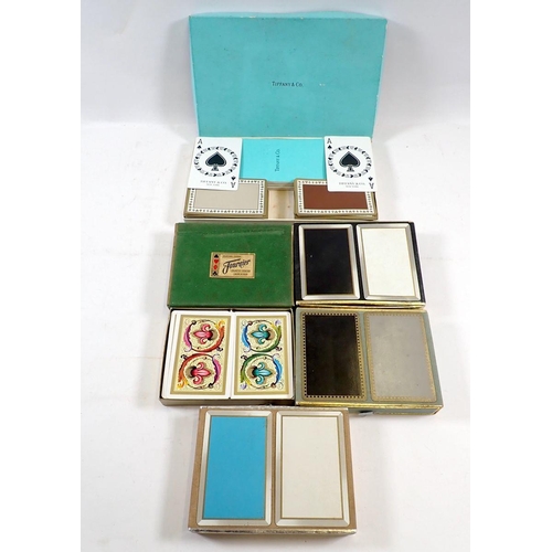 759 - A Tiffany & Co bridge card game set together with four twin set packs of cards by Fournier and Congr... 