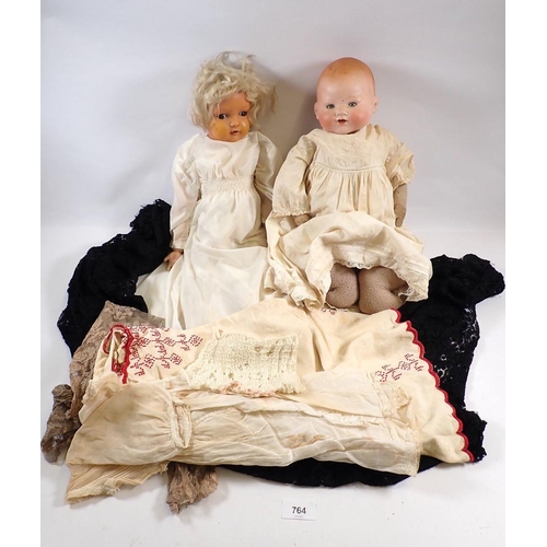 764 - An Armand Marseille bisque head doll 351.14 and a Kammer & Reinhardt German early plastic doll