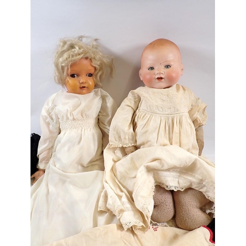 764 - An Armand Marseille bisque head doll 351.14 and a Kammer & Reinhardt German early plastic doll