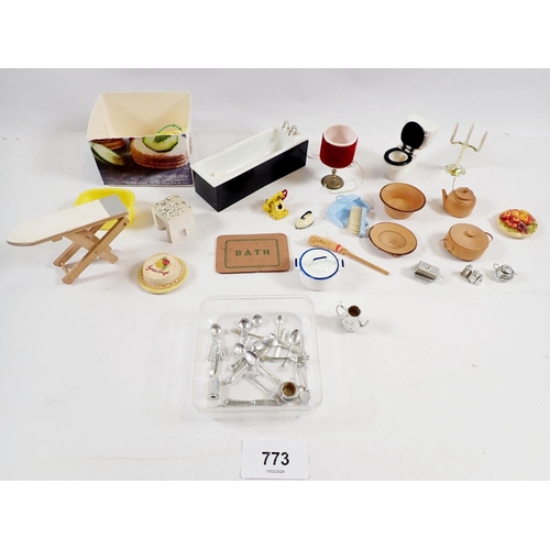 773 - A box of dolls house accessories and bathroom fittings, tea ware, cutlery etc.