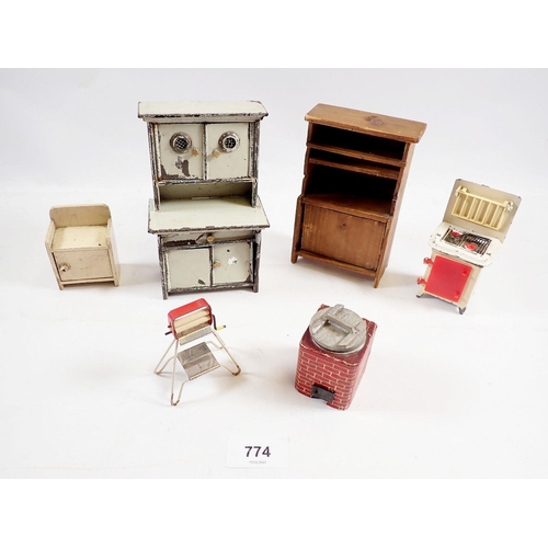 774 - A group of vintage kitchen dolls house furniture including wood dresser, enamel larder cabinet, stov... 