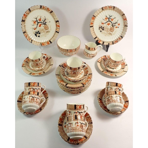 81 - A Victorian tea service decorated in Imari colours comprising eleven cups and saucers, twelve tea pl... 