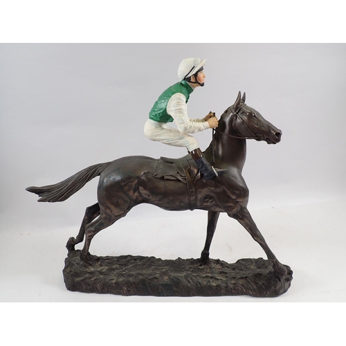 812 - A Heredities racehorse and jockey sculpture of 'Smart Money' by David Geenty, 33cm long