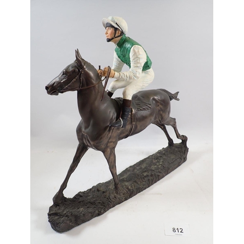 812 - A Heredities racehorse and jockey sculpture of 'Smart Money' by David Geenty, 33cm long