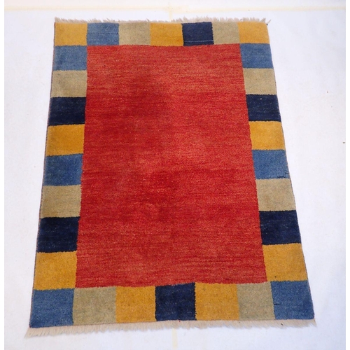 821 - A geometric coloured rug 186 x 142cm