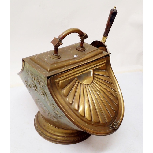 822 - A Victorian brass coal scuttle with embossed sunray decoration