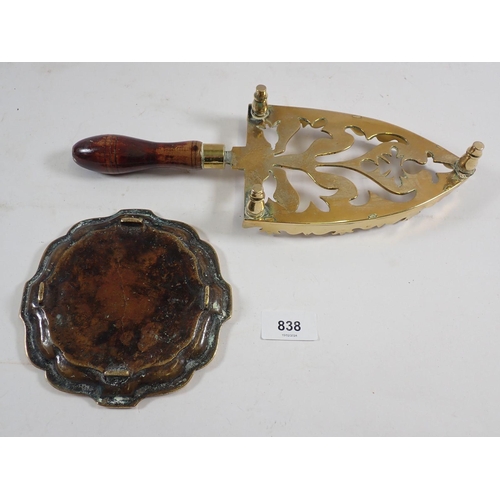 838 - A brass antique iron trivet, card tray, toasting fork etc.