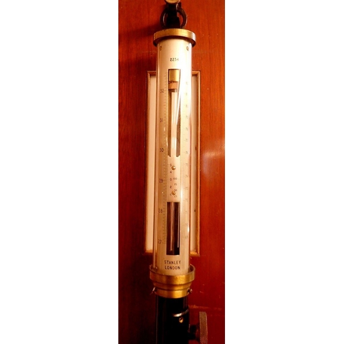 868 - A Stanley marine stick barometer on mahogany board, 110cm tall