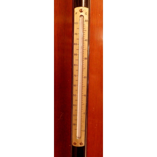 868 - A Stanley marine stick barometer on mahogany board, 110cm tall