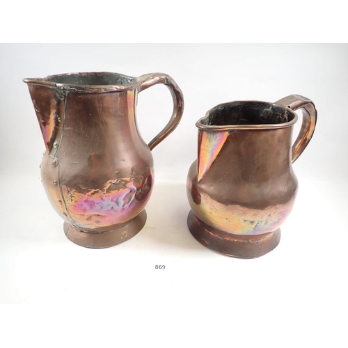 869 - Two large 19th century copper jugs, largest 26cm tall