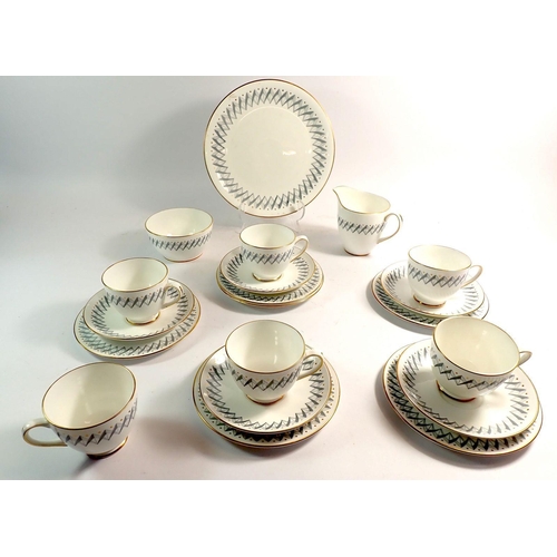 87 - A vintage Arcadia tea service comprising six cups and five saucers, milk, sugar, six tea plates and ... 