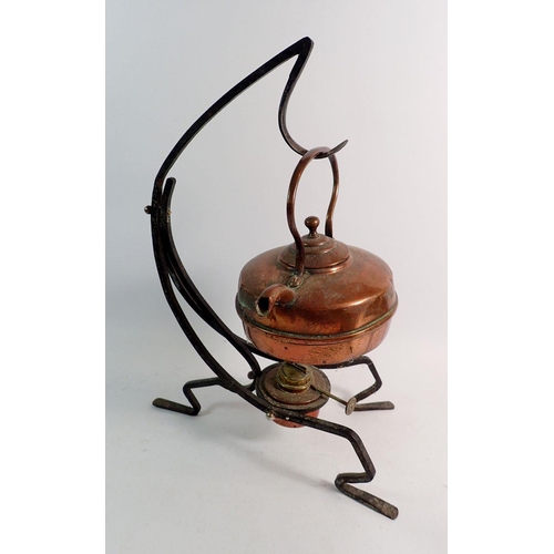 872 - A Victorian copper kettle on iron stand, 39cm tall - another copper kettle and two brass candlestick... 