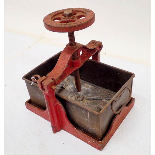 876 - A butchers cast iron meat press by W&T Ovens Ltd London, 33x28cm