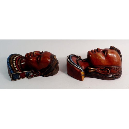 878 - Two Achatit wall masks, 19cm