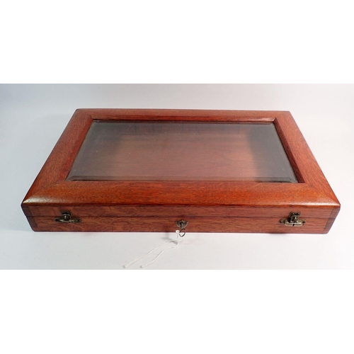 883 - A wooden glazed table top display case, 32 x 55cm