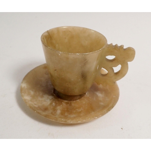 896 - A set of six Qing Dynasty Chinese jade miniature cups, 4.5cm tall and saucers with carved handles