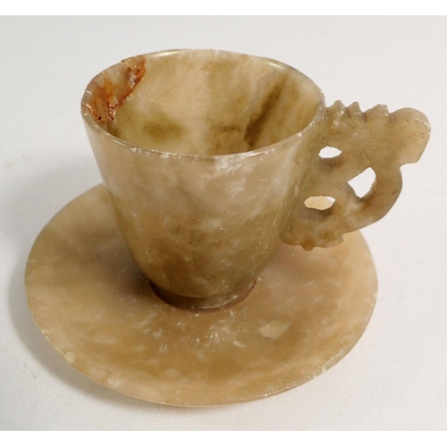 896 - A set of six Qing Dynasty Chinese jade miniature cups, 4.5cm tall and saucers with carved handles