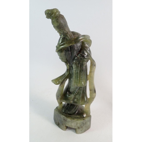 897 - Two jade carved figures of women, 23cm