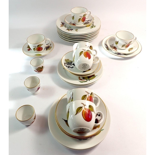 93 - A Royal Worcester Evesham tea service comprising seven cups and saucers, five tea plates, seven side... 