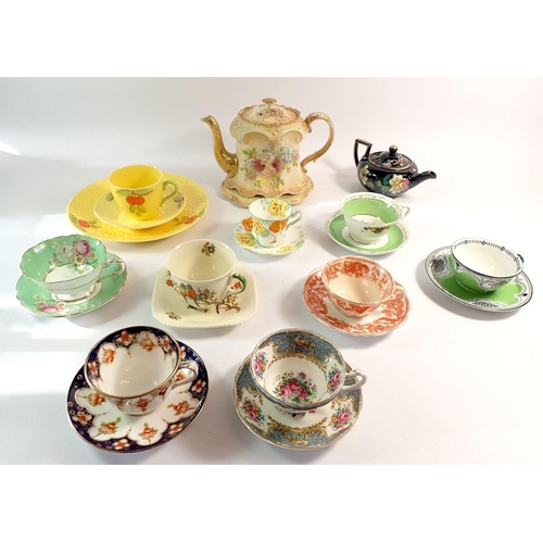 95 - A group of nine various tea cups and saucers plus a Fielding & Co teapot (spout a/f) and Victorian b... 