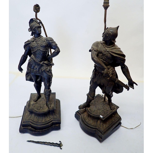 955 - A pair of 19th century spelter table lamps in the form of Greek warriors, signed Vianen, 62cm tall