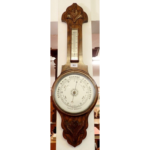 963 - An oak framed Aneroid barometer, 81cm