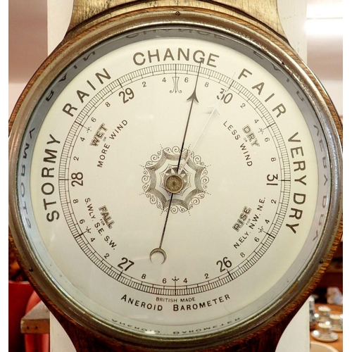 963 - An oak framed Aneroid barometer, 81cm