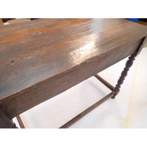 967 - A part 17th century oak side table with fielded and panelled frieze drawer all on turned supports, 9... 