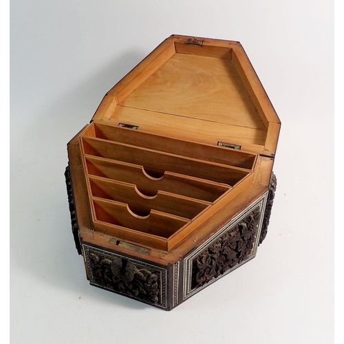 969 - An Indian carved and inlaid correspondence box with fitted interior, 23cm wide