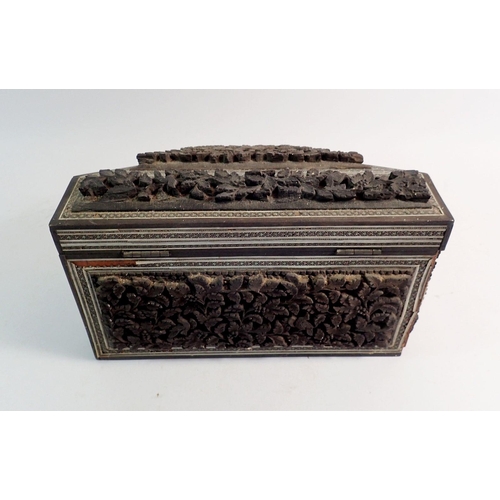 969 - An Indian carved and inlaid correspondence box with fitted interior, 23cm wide