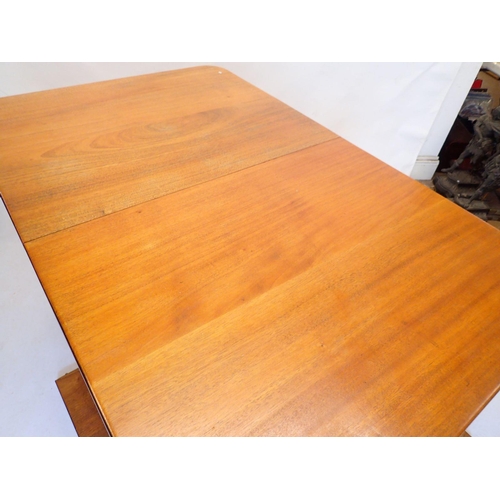 971 - A mahogany extending dining table by Wilkinsons (BFD) Ltd on square tapered supports, with two inter... 