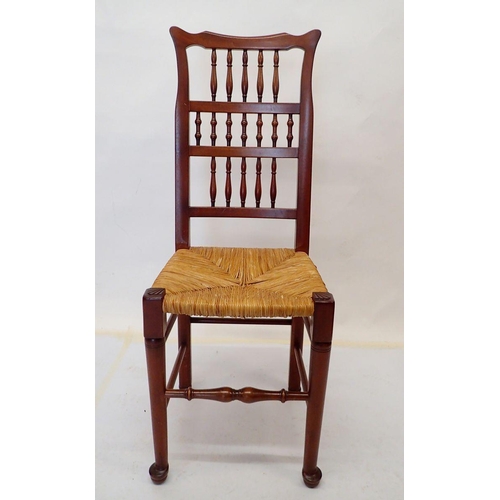 972 - A set of twelve rush seated ladder back country style dining chairs