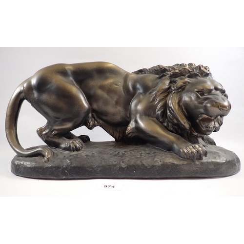 974 - A large plaster model of a lion, 41cm wide