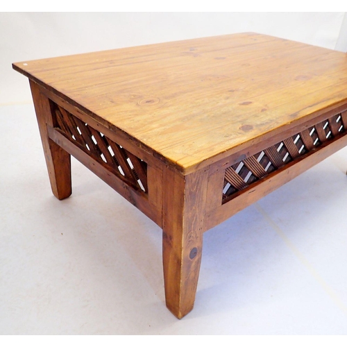 975 - A pine coffee table with lattice frieze, 120 x 180 x 99cm