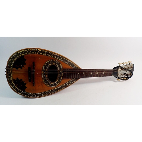 979 - A Neapolitan mandolin with mother of pearl, bone and tortoiseshell inlay, 60cm