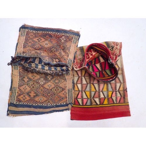 992 - A Syrian double sided saddle bag and a Persian carpet made bolster cover