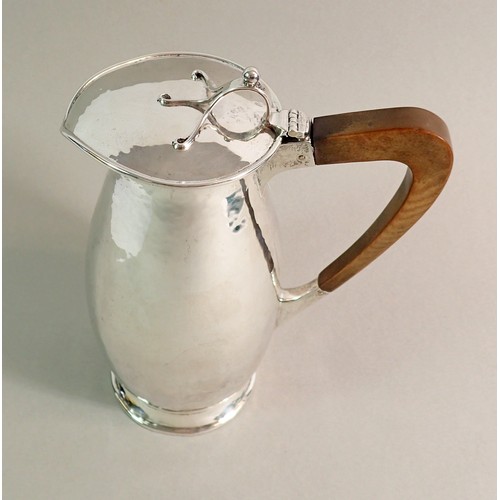 228 - An Arts & Crafts silver coffee jug, Birmingham 1919 by A E Jones, total weight 448g 20cm tall