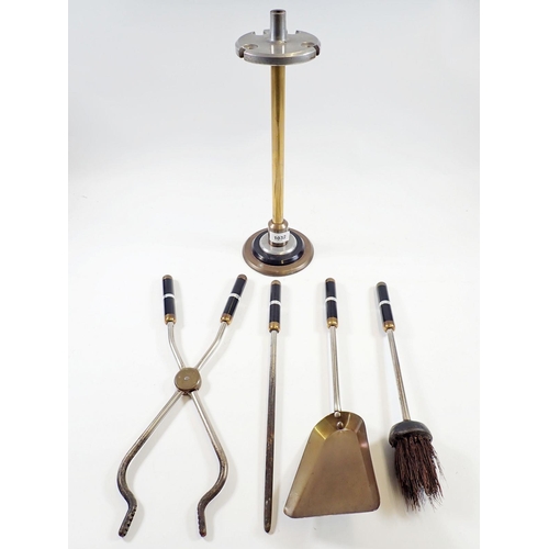 1032 - An Art Deco fireside set with black, brass and chrome fire irons