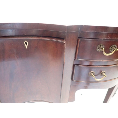 1047 - A 19th century mahogany small Georgian style serpentine fronted sideboard with two drawers flanked b... 