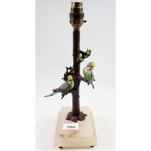 1060 - A 19th century cold painted spelter table lamp in the form of budgerigars on a tree trunk, on alabas... 