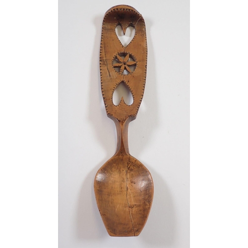 1083 - A late 18th century/early 19th century Welsh love spoon carved hearts and flowers, 18.5cm