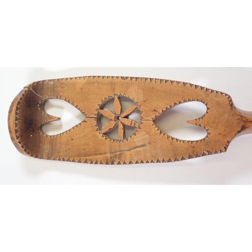 1083 - A late 18th century/early 19th century Welsh love spoon carved hearts and flowers, 18.5cm